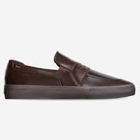 Brown slip-on shoe on a white background