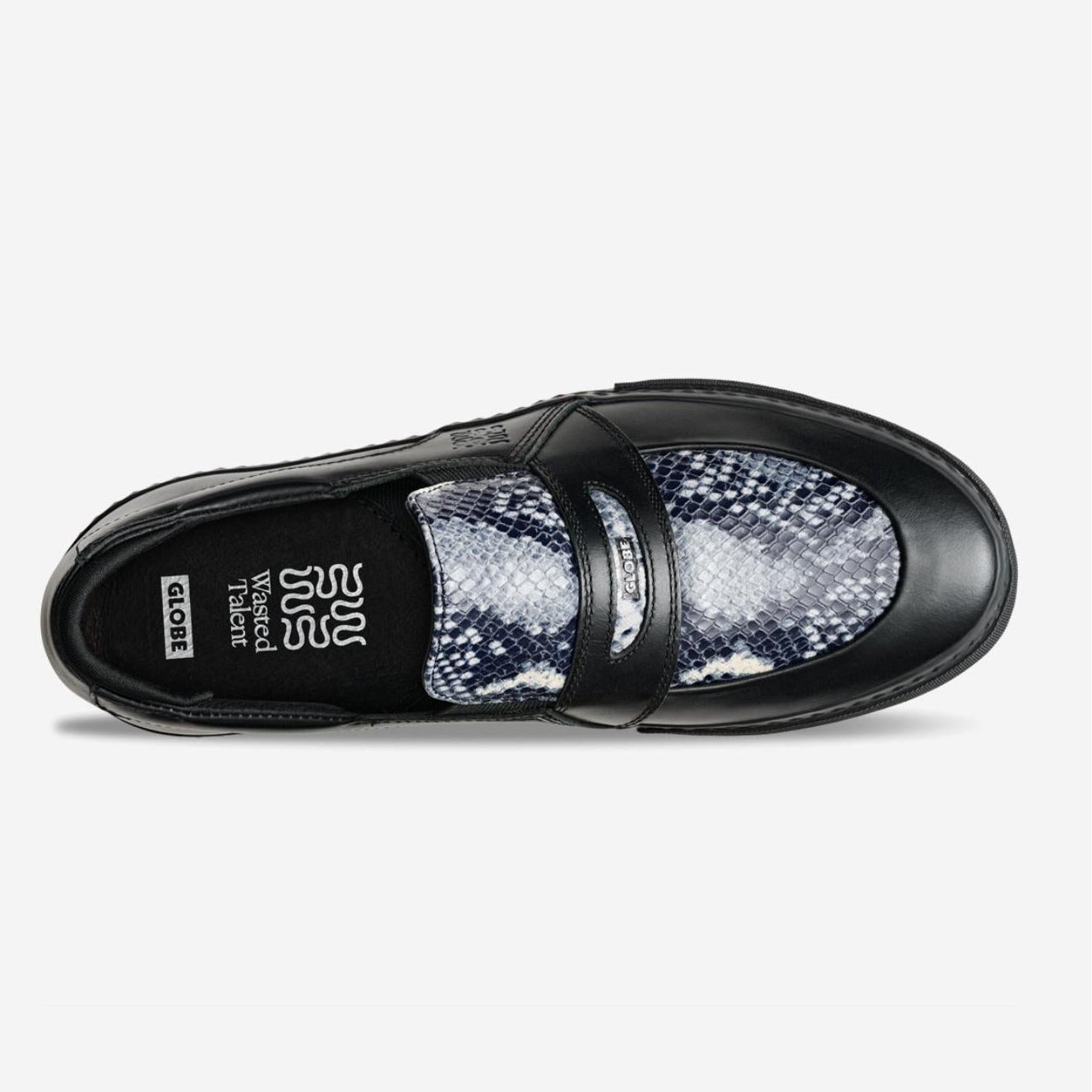 Black shoe with a patterned sole on a white background