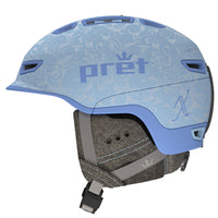 A blue Pret Vision X ski helmet with lighter blue floral patterns and pret logo on the side